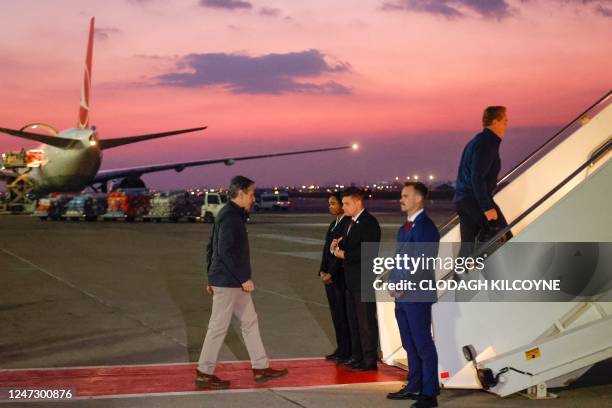 Secretary of State Antony Blinken boards an aircraft as he leaves the Incirlik Air Base near Adana on February 19 following an official visit after a...