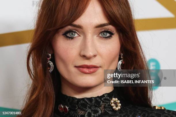 British actress Sophie Turner poses on the red carpet upon arrival at the BAFTA British Academy Film Awards at the Royal Festival Hall, Southbank...