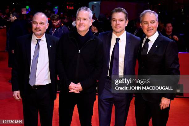 Producer Drew Vinton , US actor Matt Damon , and US screenwriter Bill S Carter pose on the red carpet prior to the premiere of the film 'Kiss the...