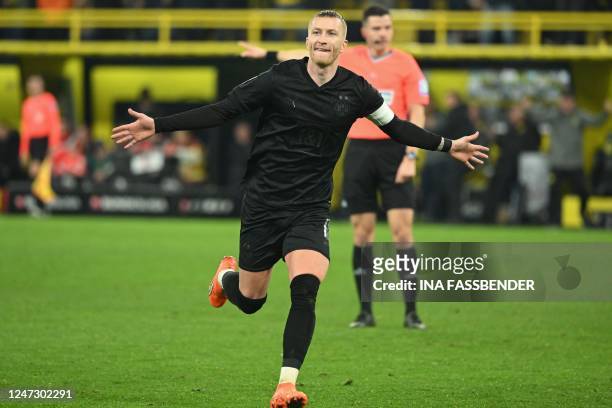 Dortmund's German forward Marco Reus celebrates scoring the 3-1 goal during the German first division Bundesliga football match between Borussia...