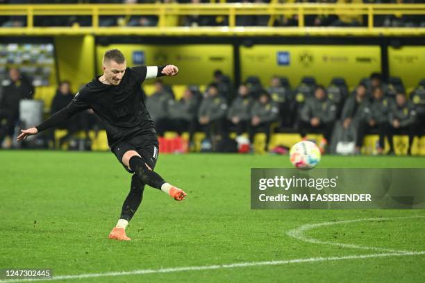 Dortmund's German forward Marco Reus scores the 3-1 goal from a free kick during the German first division Bundesliga football match between Borussia...