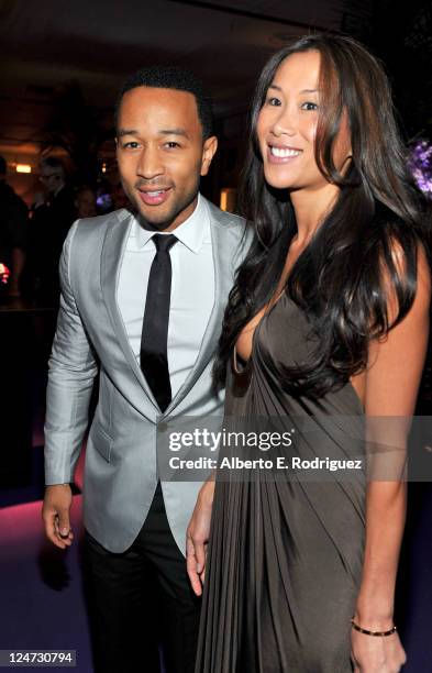 Musician John Legend and Susan Chong attend Cinema Against AIDS Toronto 2011 Benefiting amfAR And Dignitas at The Carlu Theatre on September 11, 2011...