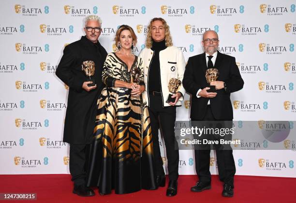 Jason Baird, Louise Coulston, Shane Thomas and Mark Coulier, winners of the Make Up and Hair Award for 'Elvis', pose in the Winners Room at the EE...