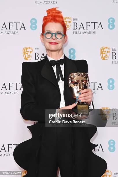 Sandy Powell, winner of the Fellowship Award, poses in the Winners Room at the EE BAFTA Film Awards 2023 at The Royal Festival Hall on February 19,...