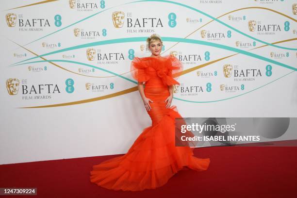 British actor Florence Pugh poses on the red carpet upon arrival at the BAFTA British Academy Film Awards at the Royal Festival Hall, Southbank...
