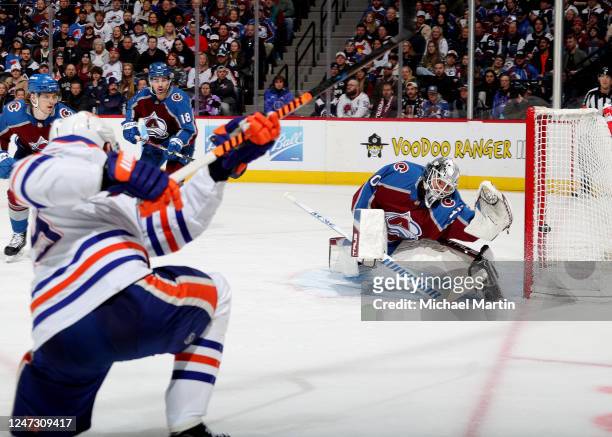 Leon Draisaitl of the Edmonton Oilers scores against goaltender Alexandar Georgiev of the Colorado Avalanche at Ball Arena on February 19, 2023 in...
