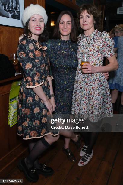 Maimie McCoy, Cara Horgan and guest attend the O Pioneers 'Kissing On Summer Streets' Salon Show during London Fashion Week February 2023 at The...