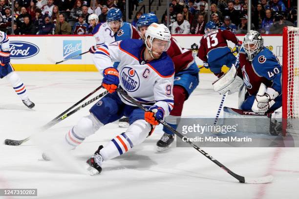 Connor McDavid of the Edmonton Oilers skates against Samuel Girard of the Colorado Avalanche at Ball Arena on February 19, 2023 in Denver, Colorado.