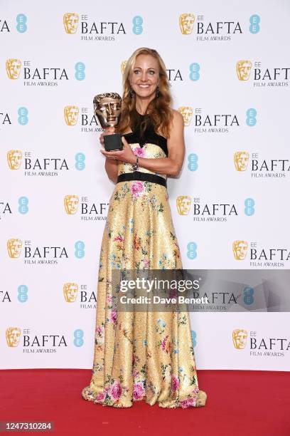 Lesley Paterson, winner of the Best Film award for "All Quiet On The Western Front", poses in the Winners Room at the EE BAFTA Film Awards 2023 at...