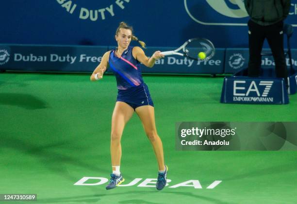 Ipek Oz of Turkiye competes with Marta Kostyuk of Ukraine during women's single first round match of Dubai Duty Free Tennis Championship in Dubai,...