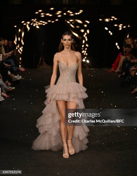 Model walks the runway at the AADNEVIK show during London Fashion Week February 2023 on February 19, 2023 in London, England.