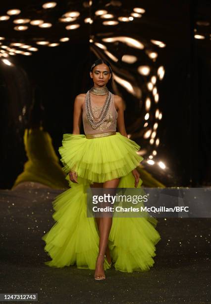 Model walks the runway at the AADNEVIK show during London Fashion Week February 2023 on February 19, 2023 in London, England.
