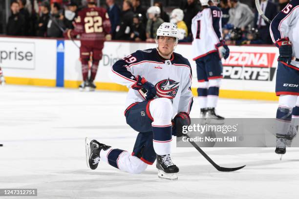 Patrik Laine of the Columbus Blue Jackets stretches during warmups prior to a game against the Arizona Coyotes at Mullett Arena on February 19, 2023...