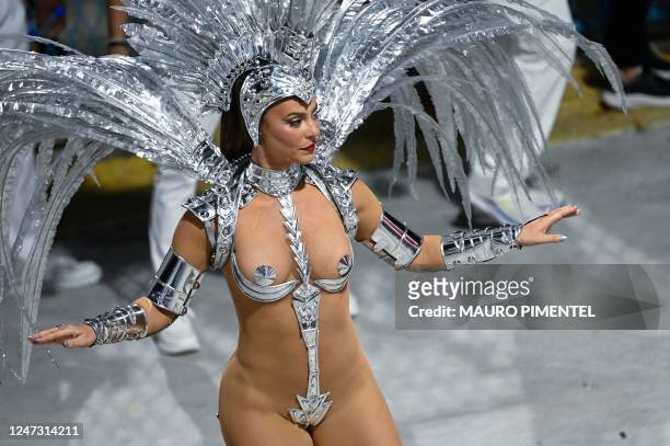 Samba Queen Paola Oliveira, from the Grande Rio samba school, performs during the first night of Rio's Carnival parade at the Sambadrome Marques de...