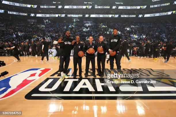 LeBron James and Giannis Antetokounmpo pose for a photo with the referees during the NBA All-Star Game as part of 2023 NBA All Star Weekend on...