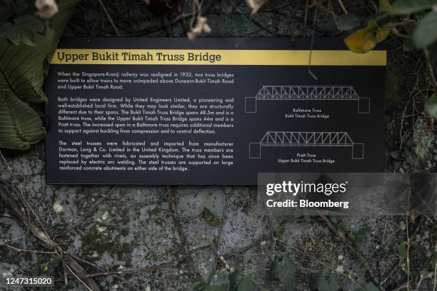 An information board on the Upper Bukit Timah truss bridge on the Rail Corridor in Singapore, on Monday, Jan. 2, 2023. A former railway line running...