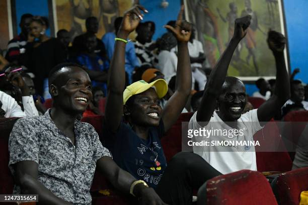 South Sudanese audience react as comedian David Lodiong imitates Pope Francis during his performance, at the Kilkilu Ana Comedy Show in Juba on...