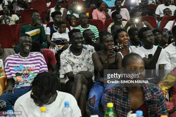 South Sudanese audience react as comedian David Lodiong imitates Pope Francis during his performance, at the Kilkilu Ana Comedy Show in Juba on...
