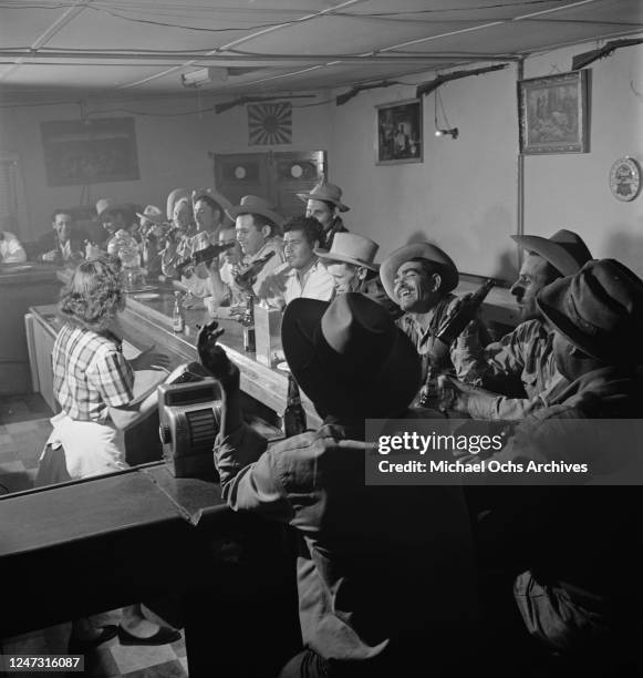 Crowded bar in Las Cruces, New Mexico, 11th April 1951.