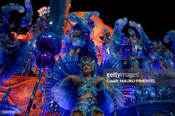 Members of the Unidos da Tijuca samba school perform during the first night of Rio's Carnival parade at the Sambadrome Marques de Sapucai in Rio de...