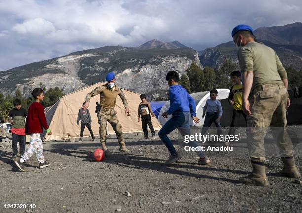 Public order commandos affiliated to Safranbolu Gendarmerie Commando Training Center Command play football with quake-hit children living at tent...
