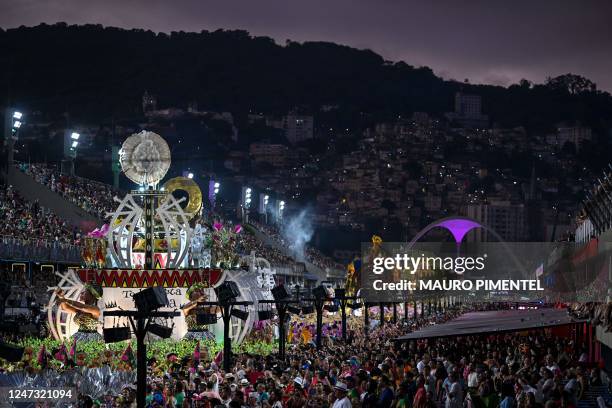 Sunrise is seen during parade of the Estacao Primeira de Mangueira samba school at the first night of Rio's Carnival parade, Sambadrome Marques de...