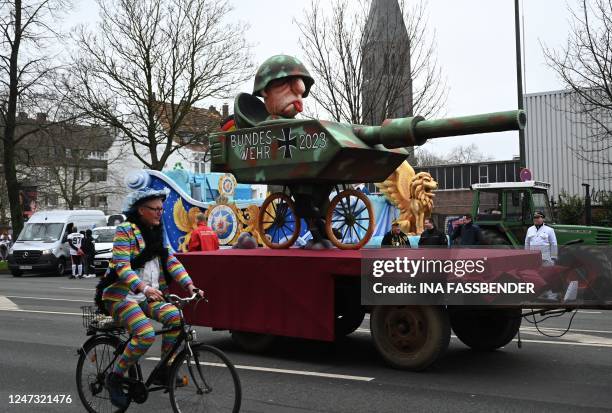 Carnival float mocks the current condition of the German armed Forces military equipment during a Rose Monday street carnival parade in Duesseldorf,...