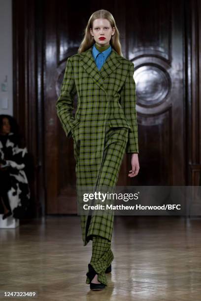 Model walks the runway at the Emilia Wickstead show during London Fashion Week February 2023 on February 20, 2023 in London, England.