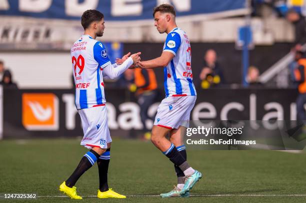 Antoine Colassin of SC Heerenveen and Sydney van Hooijdonk of SC Heerenveen substitutes during the Dutch Eredivisie match between SC Cambuur and sc...