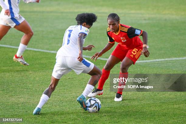 Natalia Mills of Panama National Women's soccer team and Olivia Upaupa of Papua New Guinea National Women's soccer team seen in action during the...