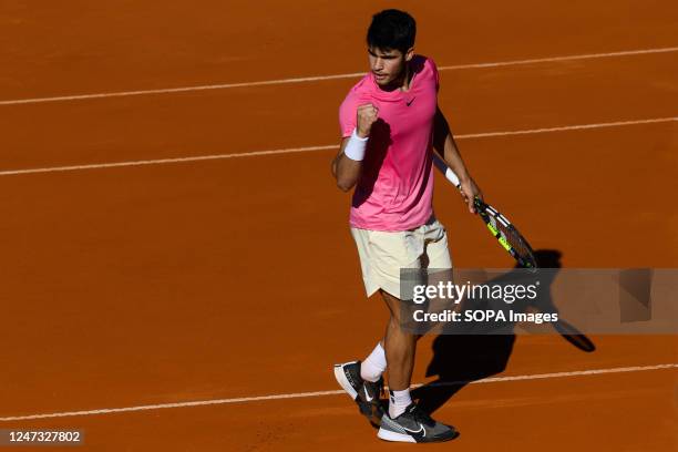 Carlos Alcaraz of Spain celebrates after winning a point in the Men's Singles Final against Cameron Norrie of Great Britain during day seven of the...