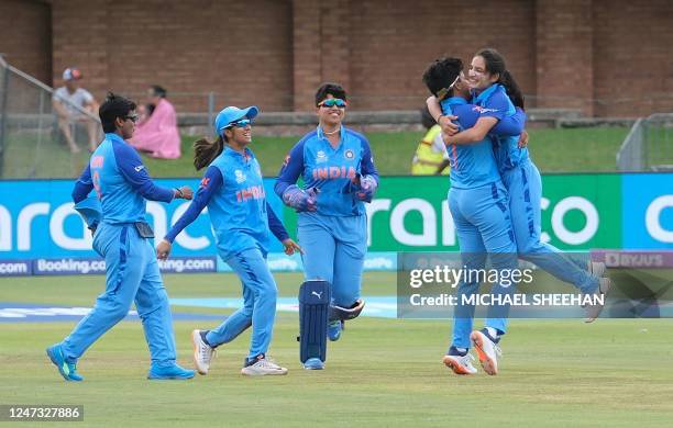 India's Renuka Singh Thakur celebrates with teammates after the dismissal of Ireland's Orla Prendergast during the Group B T20 women's World Cup...