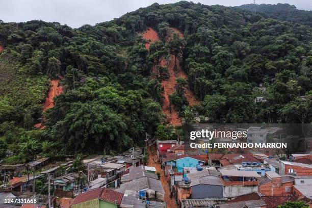 Aerial view showing lansdslides after torrential rain in the Juquehy district in Sao Sebastiao, Sao Paulo state, Brazil, on February 20, 2023. -...