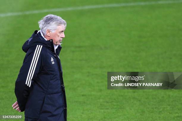 Real Madrid's Italian coach Carlo Ancelotti reacts as he attends a team training session at Anfield Stadium in Liverpool, north-west England on...