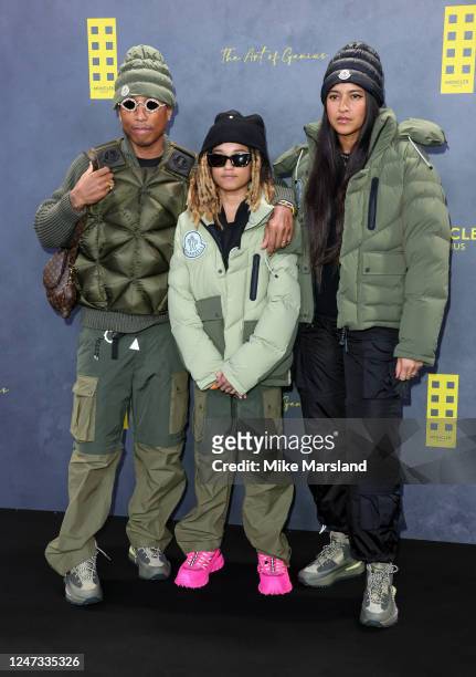 Pharrell Williams, Rocket Ayer Williams and Helen Lasichanh attend the Moncler Genius presentation during London Fashion Week February 2023 on...