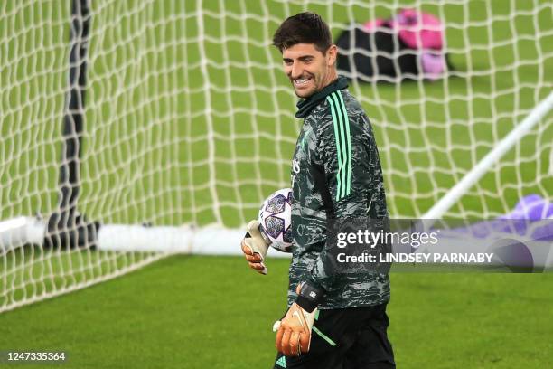 Real Madrid's Belgian goalkeeper Thibaut Courtois attends a team training session at Anfield Stadium in Liverpool, north-west England on February 20...