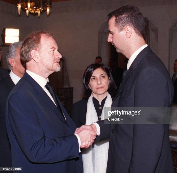 British Secretary for Foreign Affairs Robin Cook offers his condolences to Syrian heir apparent Bashar al-Assad at the state funeral of his father...