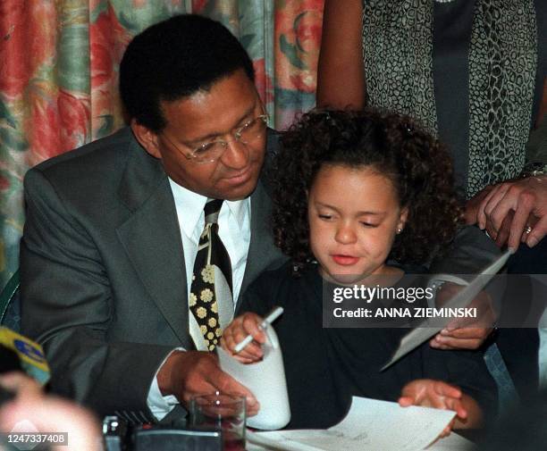 Allan Boesak, former head of the Foundation for Peace and Justice, talks to his daughter Sarah-Lien during a press conference held in Cape Town 14...