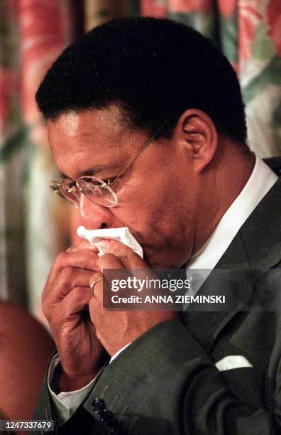 Allan Boesak, former head of the Foundation for Peace and Justice, wipes his nose during a press conference held in Cape Town 14 May 2000 on the eve...