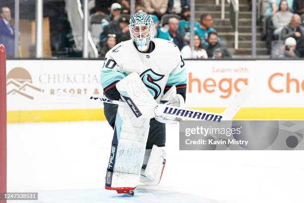 Martin Jones of the Seattle Kraken makes a save against the San Jose Sharks at SAP Center on February 20, 2023 in San Jose, California.