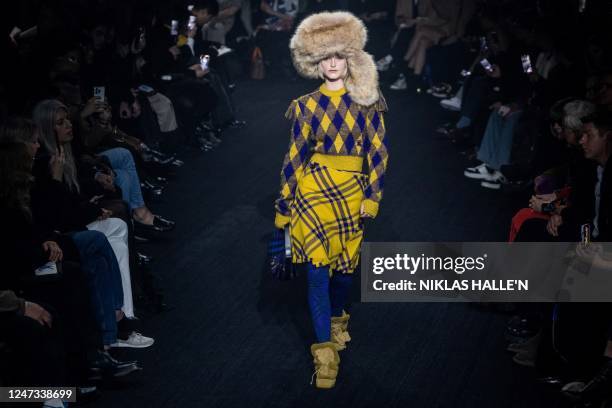 Model presents a creation for British fashion house Burberry during the Autumn/Winter 2023 fashion show collection on the fourth day of the London...