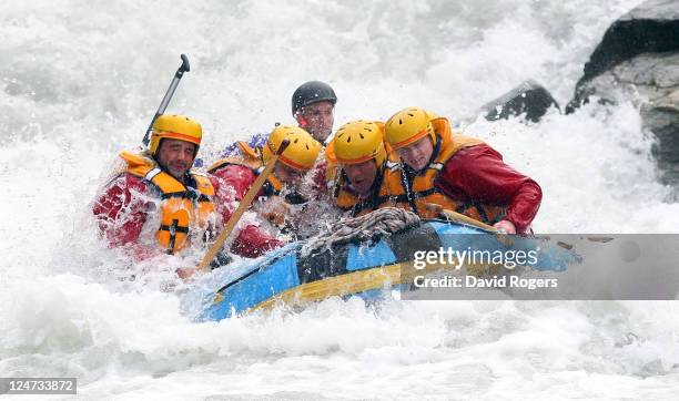 Ben Foden, Nick Easter, Simon Shaw and Chris Ashton of England shoot the rapids during a white water raft run during an England IRB Rugby World Cup...