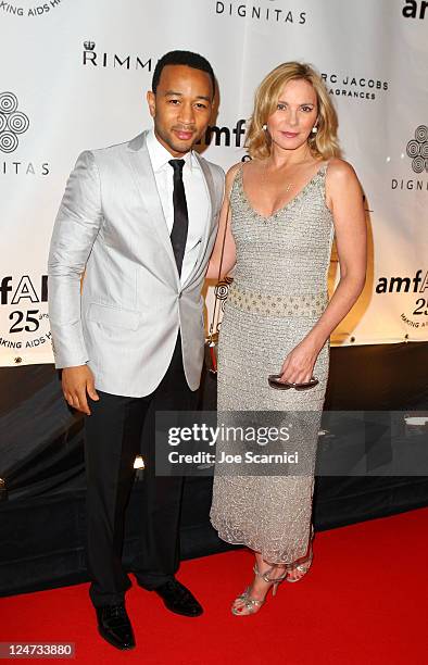 Musician John Legend and actress Kim Cattrall arrive at Cinema Against AIDS Toronto 2011 Benefitting amfAR and Dignitas at Ryerson Theatre on...