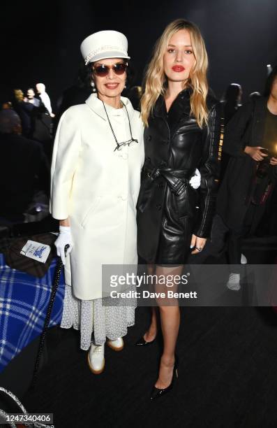 Bianca Jagger and Georgia May Jagger attend the Burberry Autumn Winter 2023 show during London Fashion Week at Kennington Park on February 20, 2023...