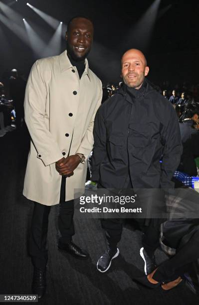 Stormzy and Jason Statham attend the Burberry Autumn Winter 2023 show during London Fashion Week at Kennington Park on February 20, 2023 in London,...