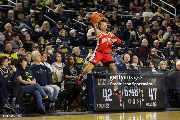 Ohio State Buckeyes guard Rikki Harris tries to save the ball from going out of bounds during the third quarter of a Big Ten Conference regular...