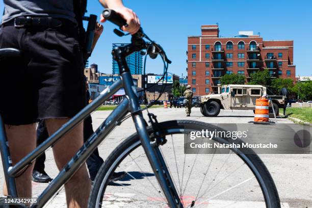 Protesters with bikes like the streets as the National Guard stands nearby on June 06, 2020 in Chicago, Illinois. This is the 12th day of protests...