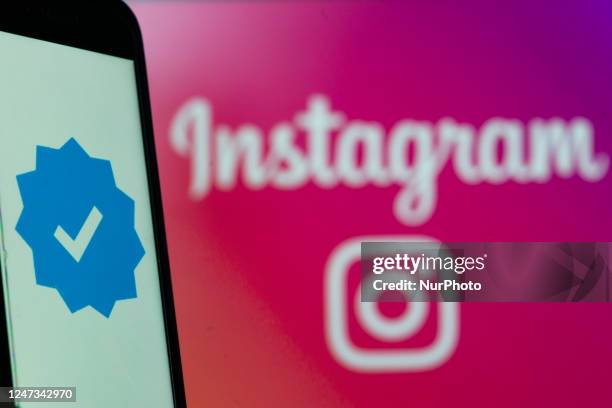 Logo of Instagram social media application and a blue verification checkmark are seen on February 20, 2023 in L'Aquila, Italy. Meta CEO Mark...
