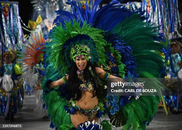 Member of the Beija Flor samba school performs during the second night of Rio's Carnival parade at the Sambadrome Marques de Sapucai in Rio de...