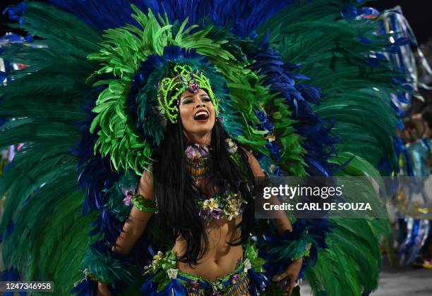 Member of the Beija Flor samba school performs during the second night of Rio's Carnival parade at the Sambadrome Marques de Sapucai in Rio de...